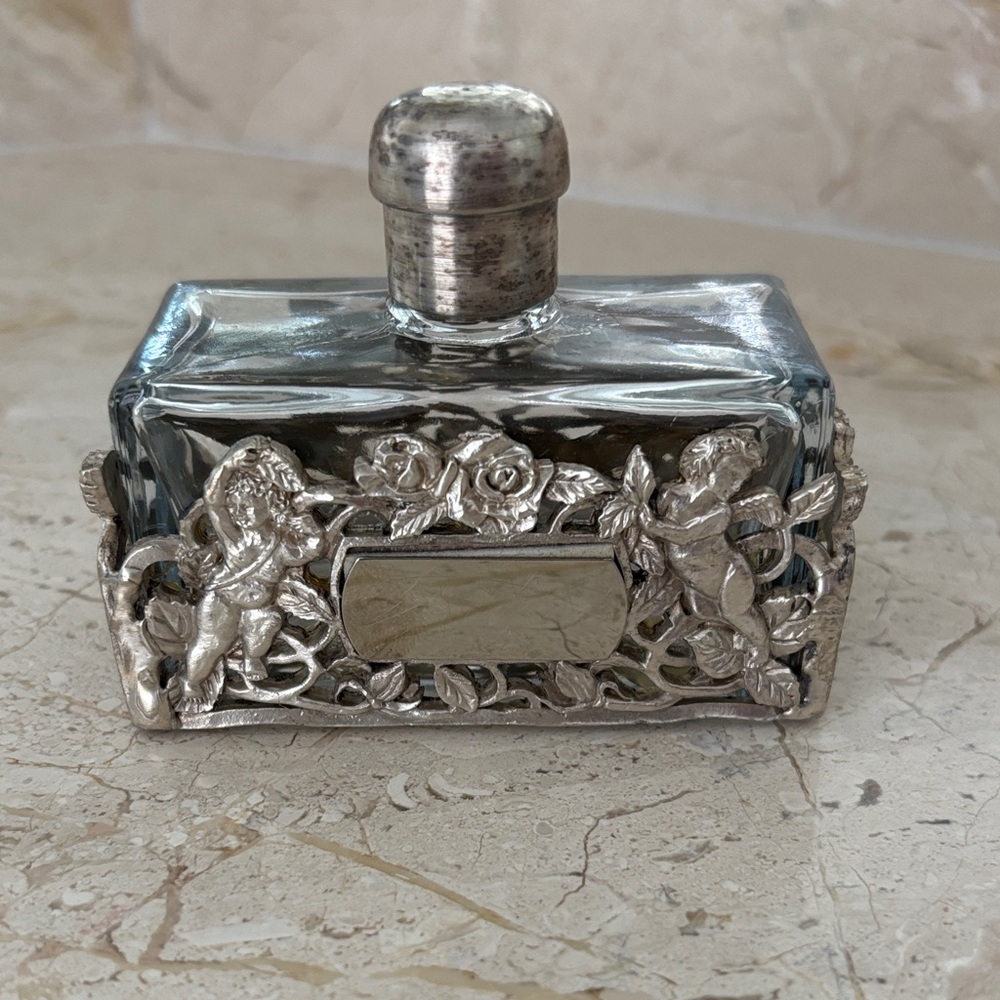 vintage glass perfume bottle with  metal overlay